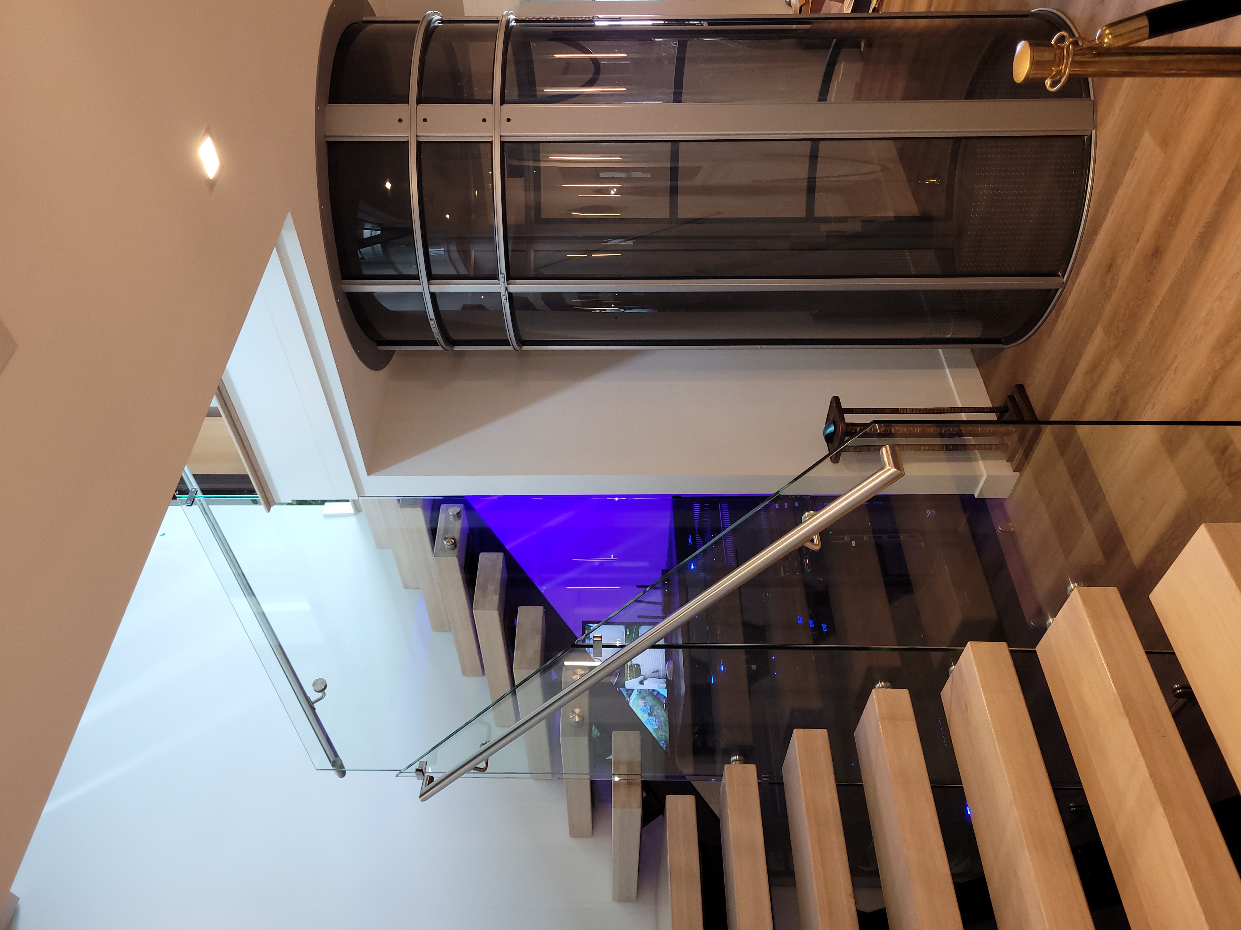 Floating staircase with glass railing